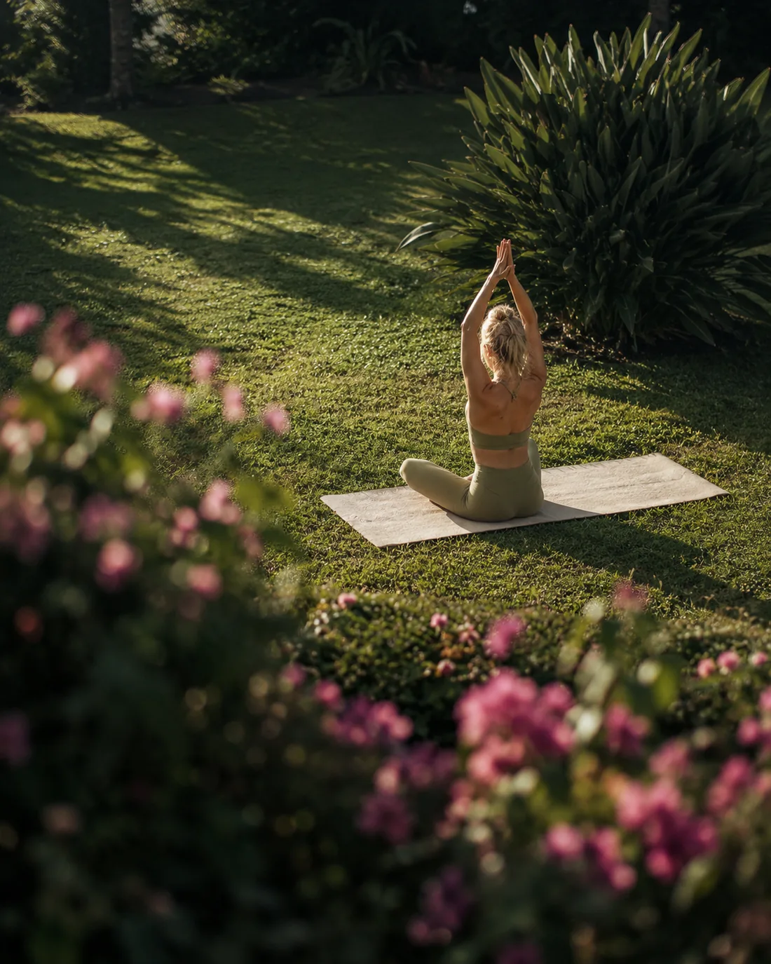Morning yoga on the mat in the garden